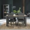 Bentley Designs Oakham Dark Grey and Scandi 4 to 6 Seater Extending Dining Table with 4 Dark Grey Chairs in Dark Grey Bonded Leather