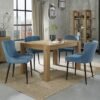 Bentley Designs Turin Light Oak 4-6 Seater Extending Dining Table with 4 Cezanne Petrol Blue Velvet Chairs - Black Legs