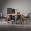 Bentley Designs Turin Light Oak 6-8 Seater Extending Dining Table with 6 Fontana Grey Velvet Chairs